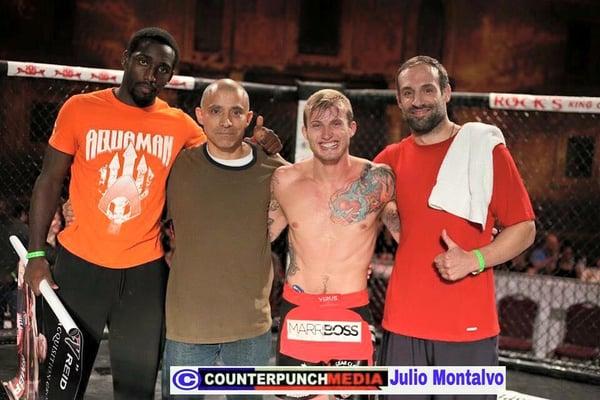 Parker "Spidey" Reid with Coaches Jamie Miller, Frank Caballero, and Professional MMA Fighter Anthony "Aquaman" Ivy.