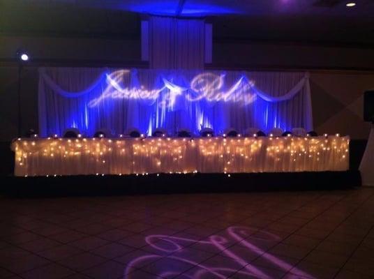 Uplighting and Gobo of Wedding Couples last name intial are featured in this photo