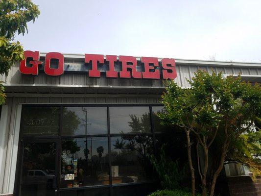 Go tires sign on stree