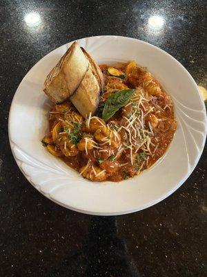 Gnocchi Di Estive - Potato gnocchi, B7 marinara, yellow squash, zucchini,  red pepper, red onion, parmesan, green onions