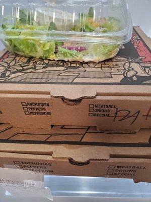 Salad, cheesesticks, Pizza boxes