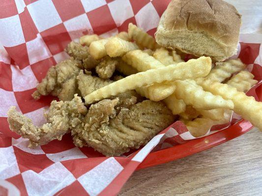 Chicken tenders, fries, and a roll