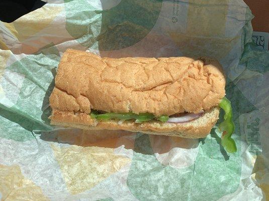 Six inch steak & cheese sub on wheat. Poor thang is flatter than I was in the 6th grade:)