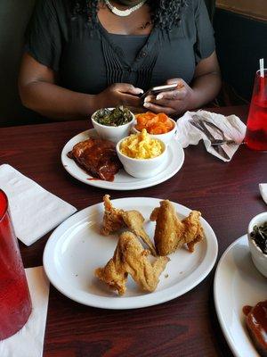 Fried chicken, pork ribs, greens, macaroni and cheese, and yams!