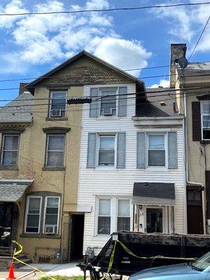 Thomas house before painting and roof replacement