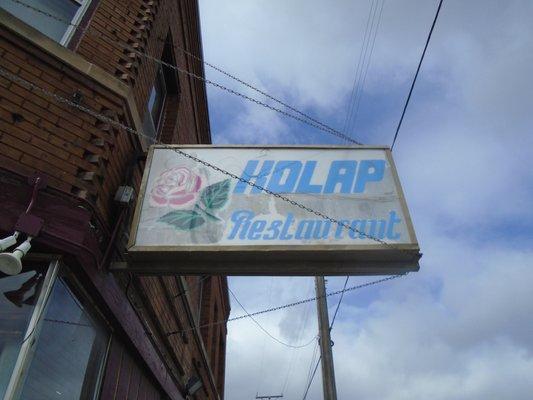 Main sign - Kolap translates to the word "rose".