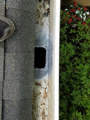 This is a downspout cup that has cracked and started leaking. We reseal the cups.