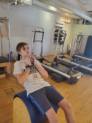 This studio does Personal Training, and Pilates!  This young man is a baseball player in training!