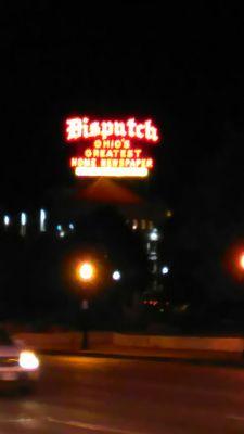 The Dispatch sign at night