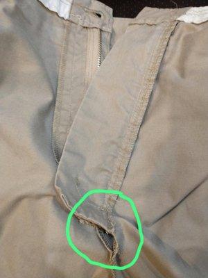 Shorts with small hole just below newly installed zipper