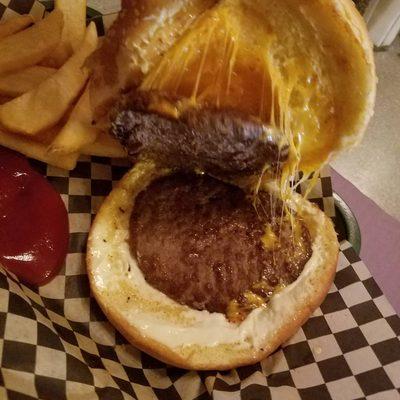 My jumbo outlaw cheeseburger with 1/2 lb of beef on a six inch bun. Way overpriced for a couple McDonalds quarter pounders on a giant bun.