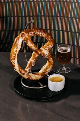 Nothing goes better with an Ellis Island beer than a giant pretzel and beer cheese. Beer cheese is made with our Ellis Island Pilsner.