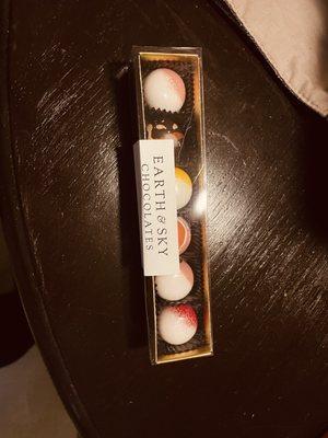 This truly was the best chocolate EVER! . Bananas Foster, crème Brûlée, Padsion fruit, strawberry rose..Oh My! 6 for $21. Soooo worth it!