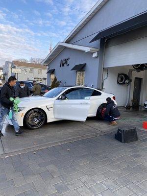 The APC Team making sure every part of the car is dry and clean! The best!