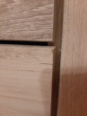 Scuff on corner of drawer (chest of drawers)