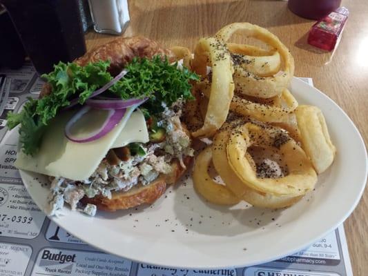 Homemade turkey salad on a grilled croissant with their homegrown Serrano hot peppers and a side of onion rings! Yum!