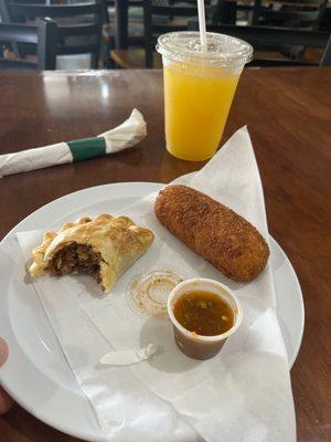 argentine empanada and stuffed yuca with maracuyá (passion fruit) juice