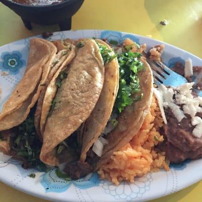 Carne asada tacos and rice and beans