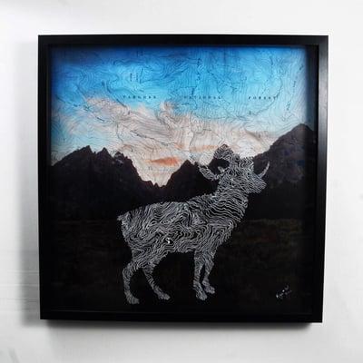 Big horn sheep drawn from a map of the Teton national forest-  original Teton photograph in the background.