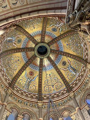 Gold dome over the statue.