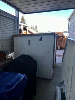 Remove and haul away shed.