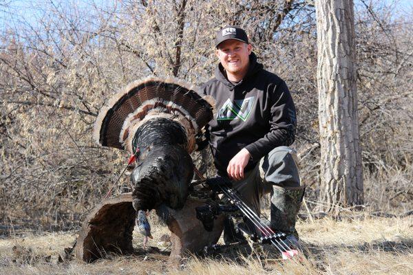 SUCCESS!  First gobbler with a bow for Nexgen family member Quinn.