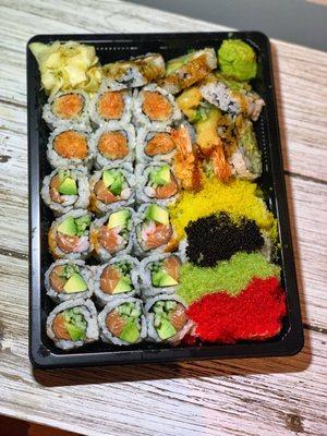 R7. Alaska Roll, R2. New York Roll, R10. Spicy Salmon Roll, A7. Shrimp Tempura, SR8. Tobiko Rainbow Special Roll