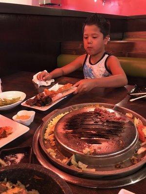 My kiddo cooking his bulgogi.