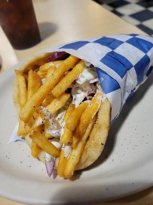 Chicken Gyro just like in Greece with extra crispy fries and homemade tzatziki.  So delicious!