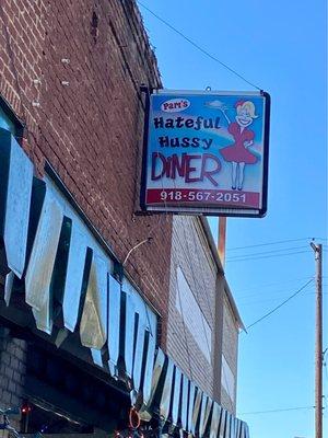 Pam's Hateful Hussy Diner sign