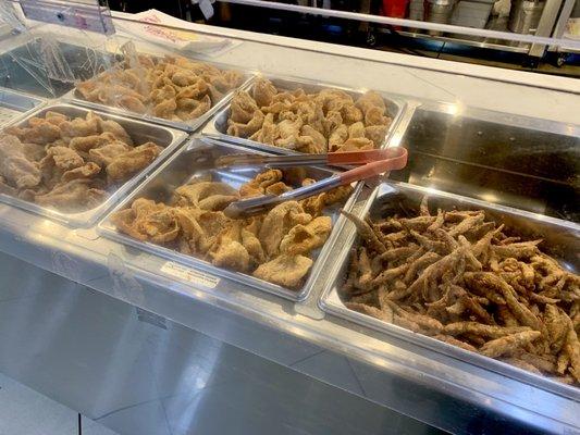 Fried smelt and fried chicken skins (4 flavors: original, garlic, vinegar & spicy).