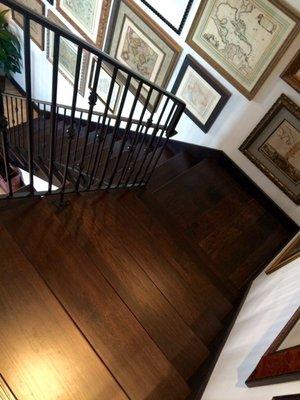 New stair treads and nosing installed, stained to blend with prefinished flooring.