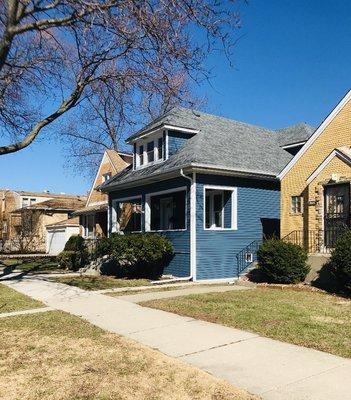 This customer received a new roof, siding, gutters, window wraps, and fascia through their insurance company.