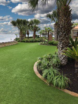 Artificial grass is low maintenance around the pool area.