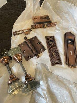 Various antique door hardware in antique copper finish