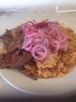 I picked yellow rice with beans and beef stew with some purple onions on top soooo Delish!