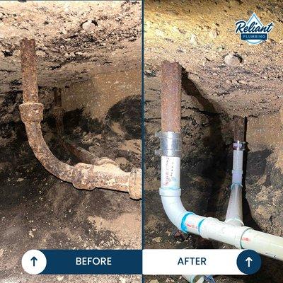 Replacing old pipes below a home in a whole-house repipe.