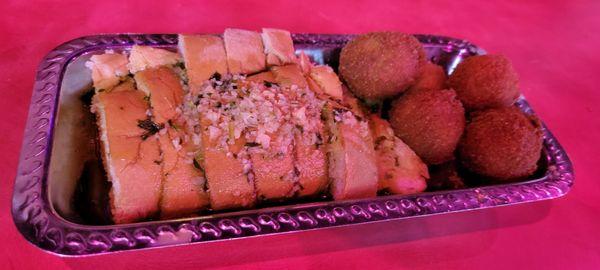 Garlic bread and hush puppies