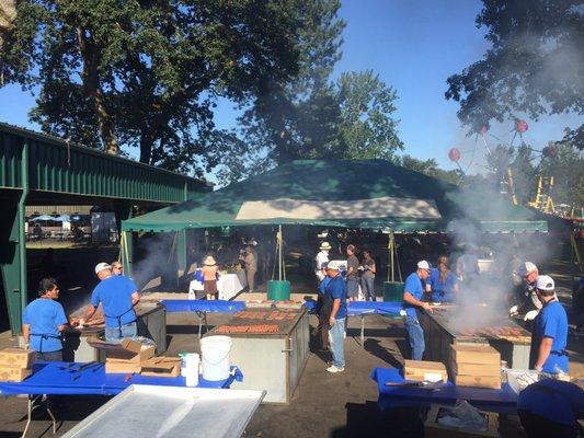 Burgers and dogs served hot off the grill for 2,000 guests