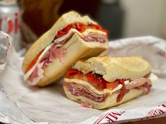 imported prosciutto, hot capicola, sweet sopressata, mortadella, fresh mozzarella, tomato, roasted red peppers, balsamic vinegar & oil