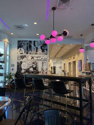 Lobby and comic book mural/wall! Seating area with cool Japanese objects/paraphernalia!