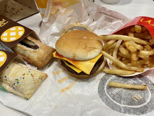 Double Cheeseburger, Medium Fries, Blueberry & Creme Pie, and Holiday Pie.