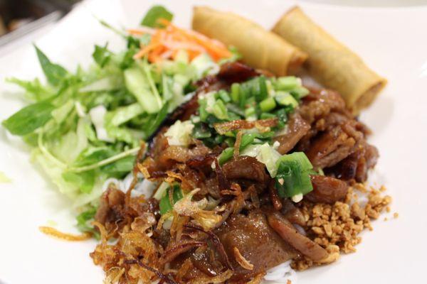 Charbroiled Sliced Pork Vermicelli w/ egg rolls.