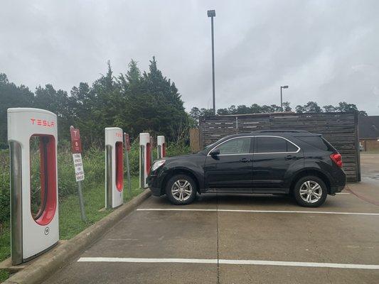 This Tesla owner must not know you have to back it up to charge it.