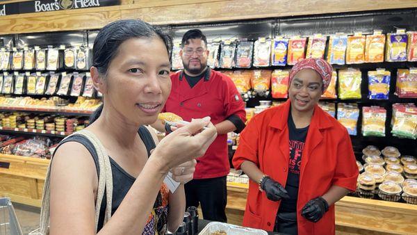 My wife tasting the Peach Cobbler