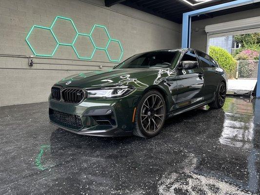 2023 BMW M5 Comp  , complete color correction and ceramic coating to bring out that San Remo Green Metallic