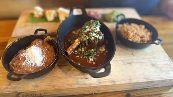 Birria bone-in beef shank | picaeta | cilantro | green onion escabeche | queso fresco | pico de gallo | guacamole