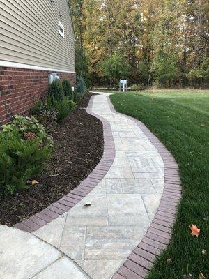 curved walkway with larger pavers