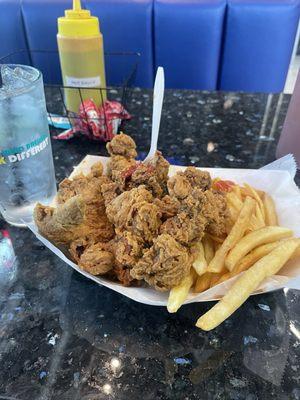 Gibblets (fried chicken gizzards & livers). Fries and 1 whole chicken wing