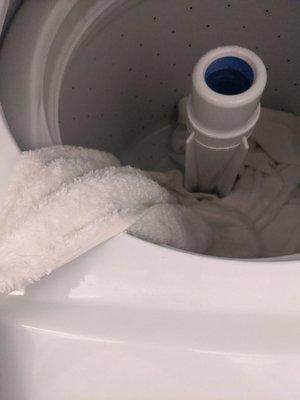 Washer didn't wash the towels & left them soaked in soapy water